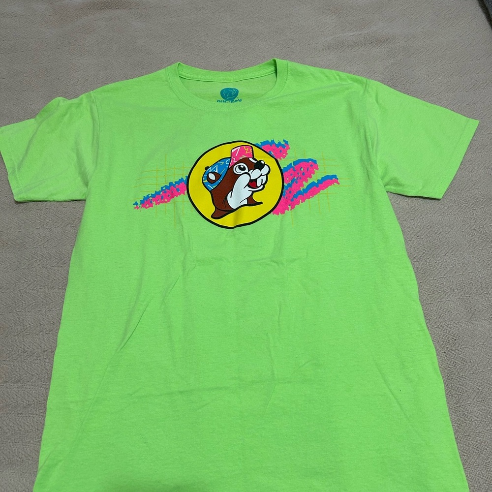 Buc ees Green Graphic T-Shirt with Cartoon Design